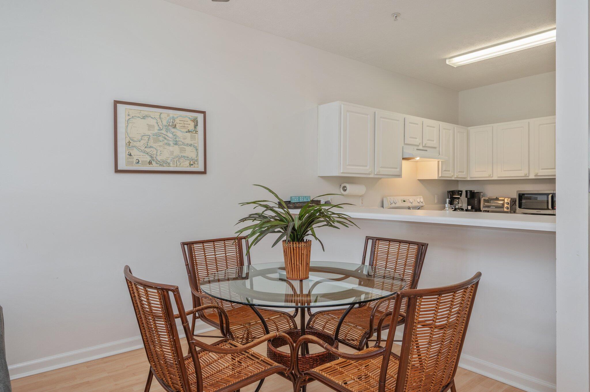 34 Heron's Watch Way, Unit 2303 Santa Rosa Beach, FL 32459 - Photo 11 of 45 a dining room with furniture and window