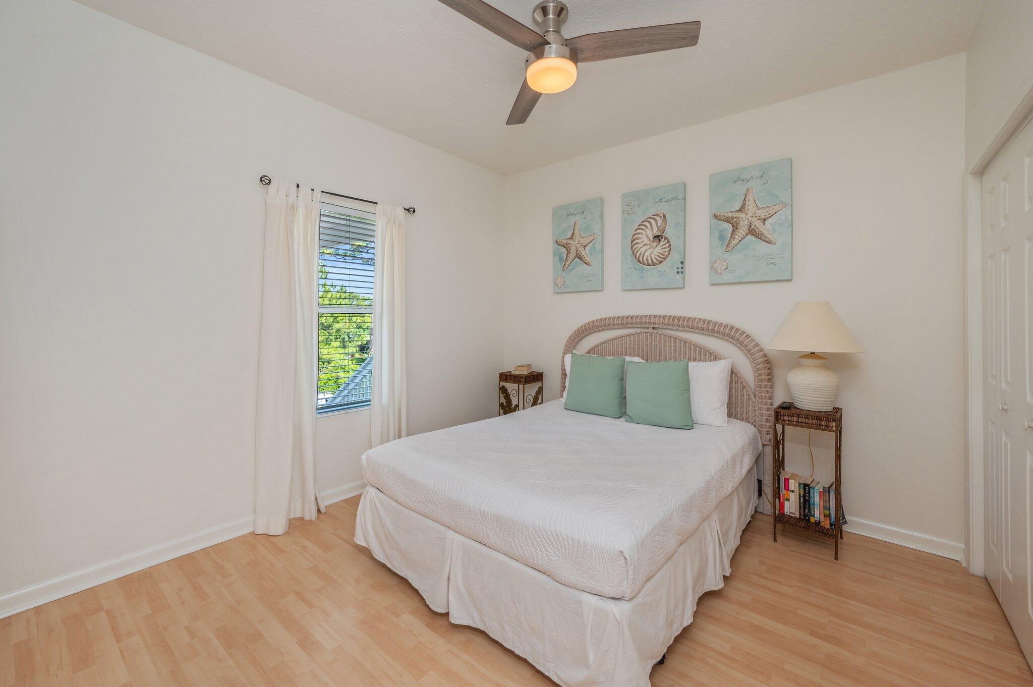 34 Heron's Watch Way, Unit 2303 Santa Rosa Beach, FL 32459 - Photo 23 of 45 a bedroom with a bed and a window
