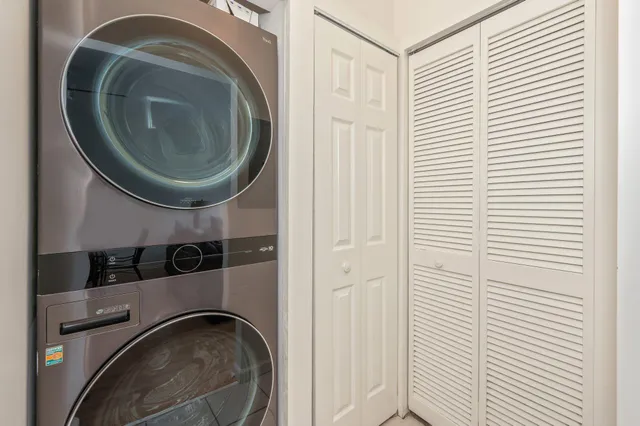 a view of a chair and table in the balcony