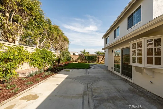 a view of a back yard of the house