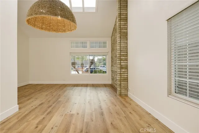 a kitchen with a sink stove and refrigerator
