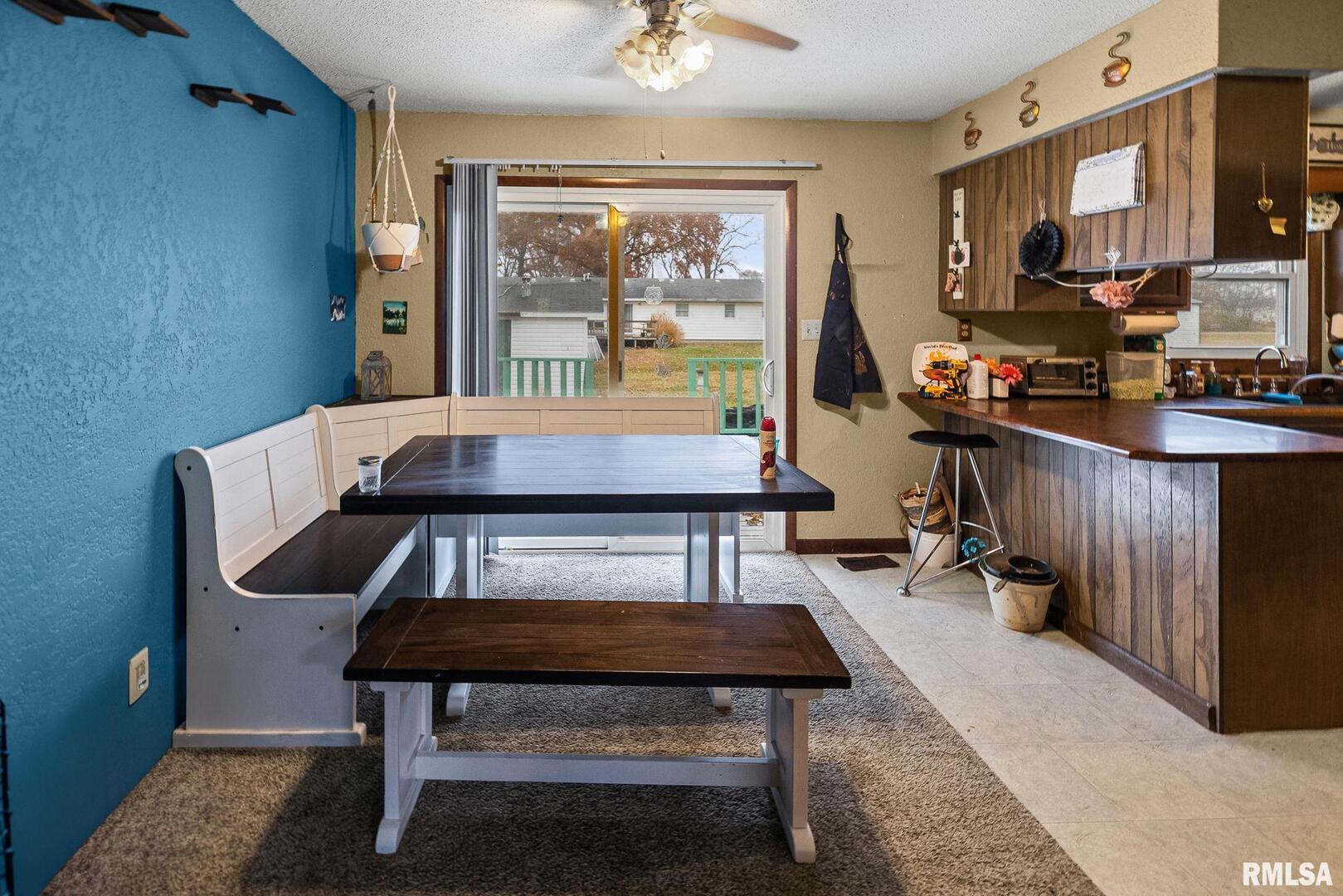 103 Middleton Street Iuka, IL 62849 - Photo 12 of 27 a room with furniture pool table flat screen tv and a window