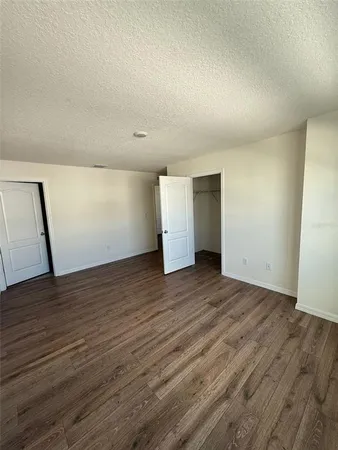 a bathroom with a toilet a sink and bathtub