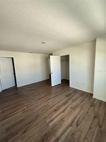 a bathroom with a toilet a sink and bathtub