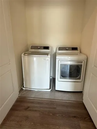 a front view of a house with garden view