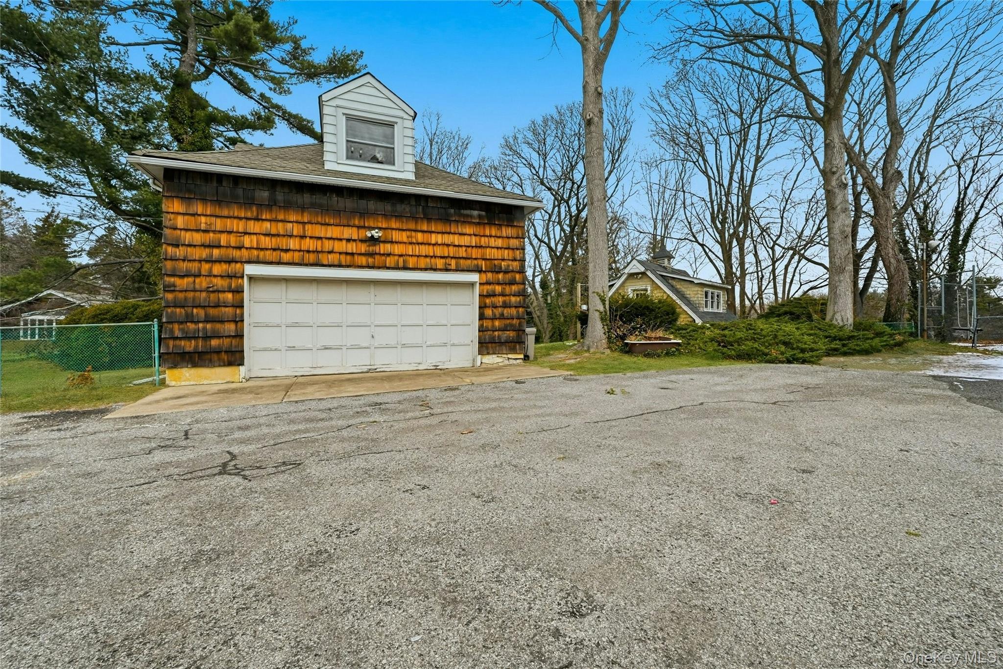 54 Cove Road Huntington, NY 11743 - Photo 5 of 24 4 Car Heated Garage w/ Loft