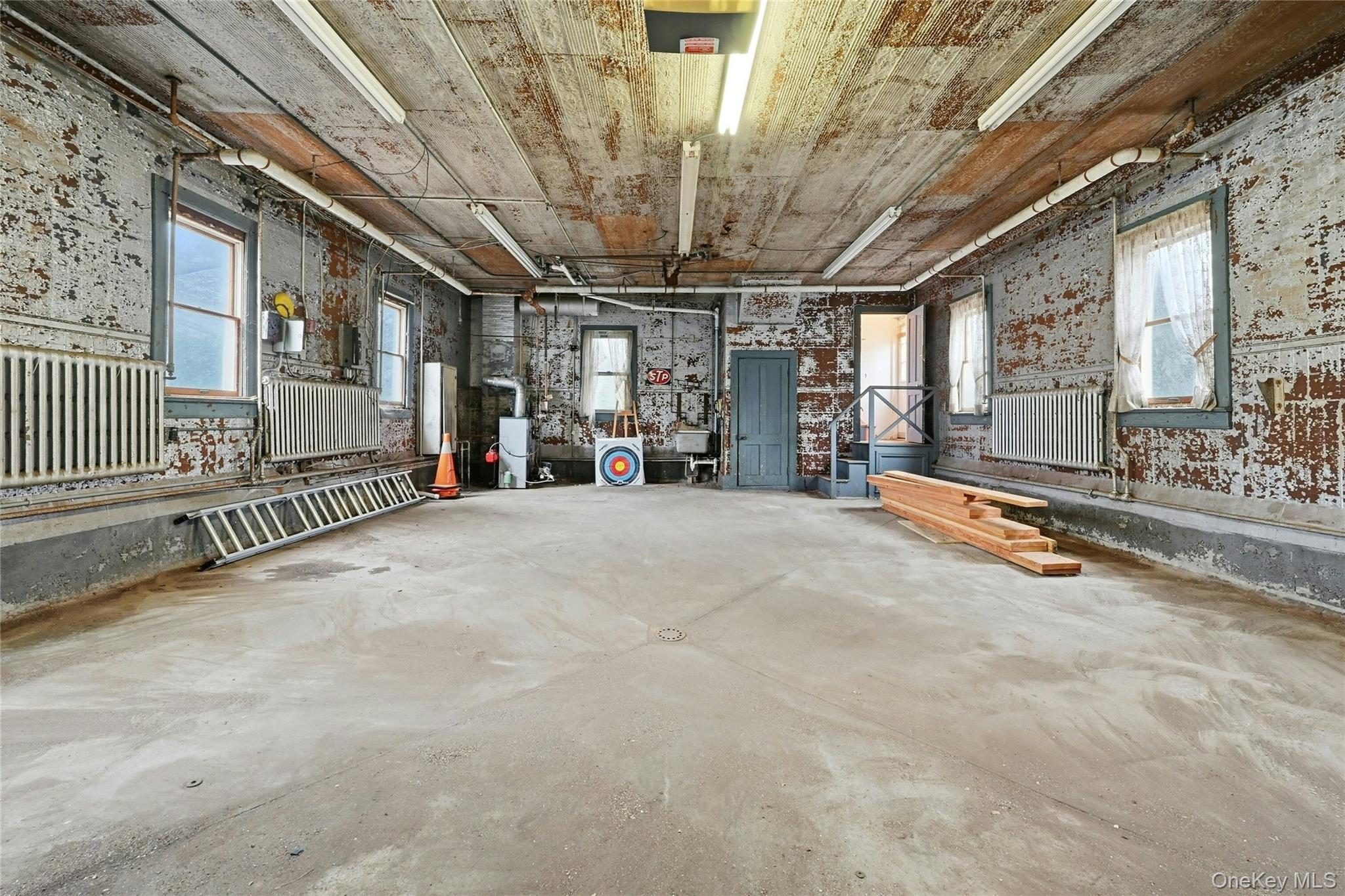 54 Cove Road Huntington, NY 11743 - Photo 6 of 24 Tandem Garage w/ High Ceilings