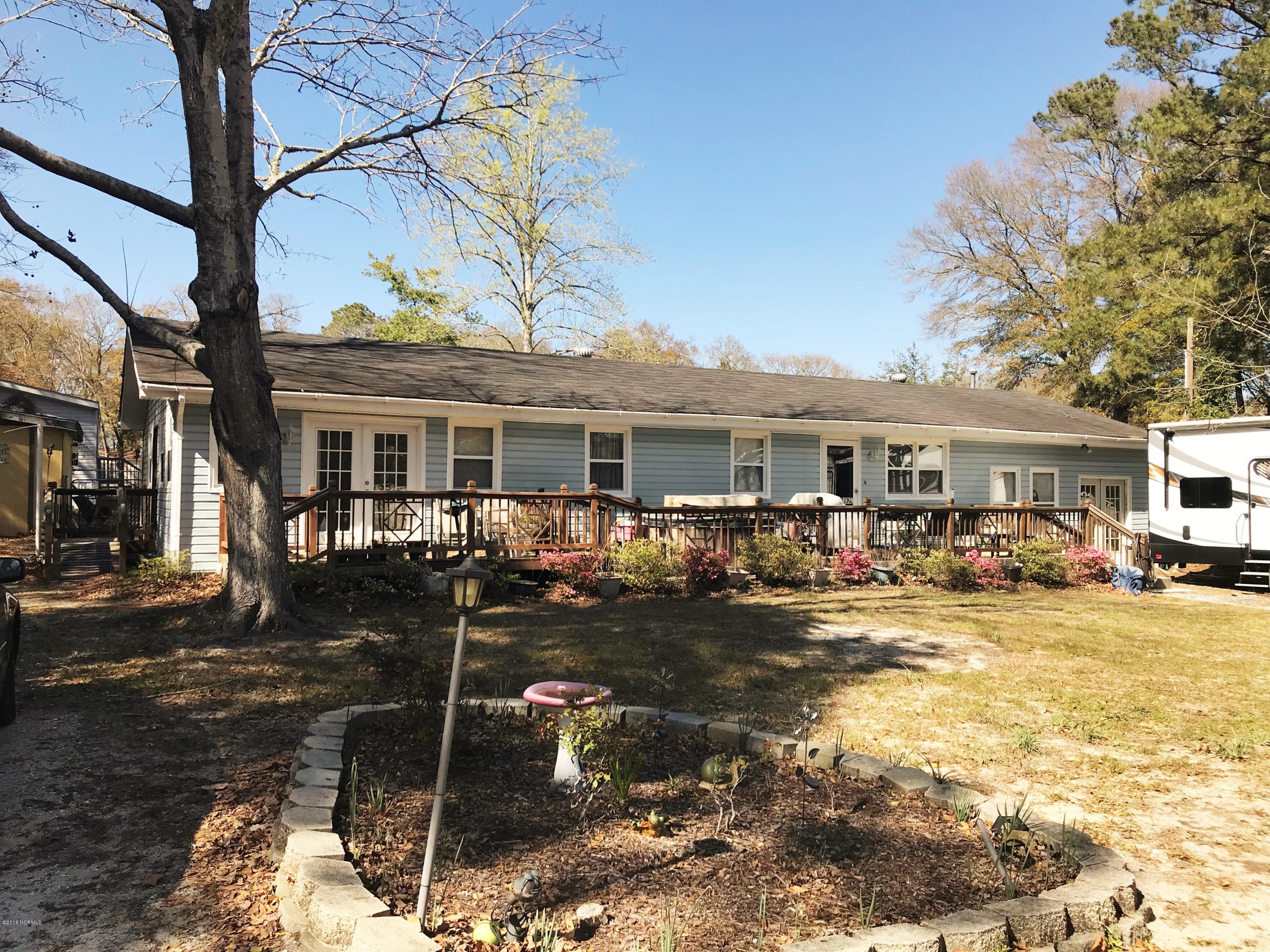 7287 Joe Brooks Road Southwest Ocean Isle Beach, NC 28469 - Photo 1 of 17 Front