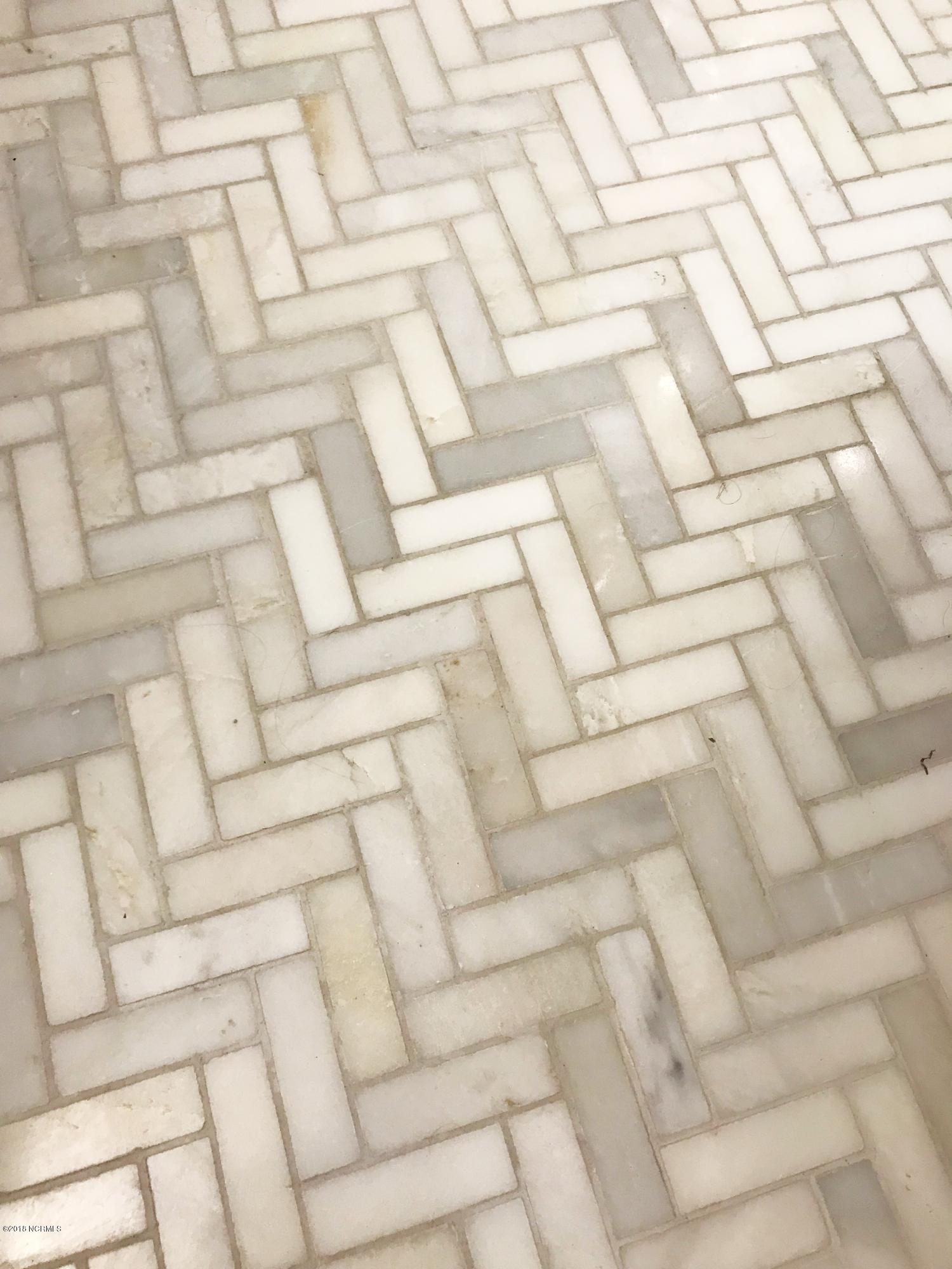7287 Joe Brooks Road Southwest Ocean Isle Beach, NC 28469 - Photo 3 of 17 Tile Floor in Bathroom