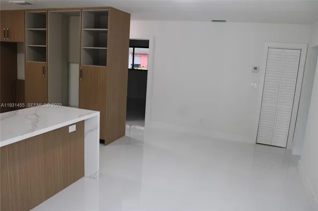 a house view with a garden space