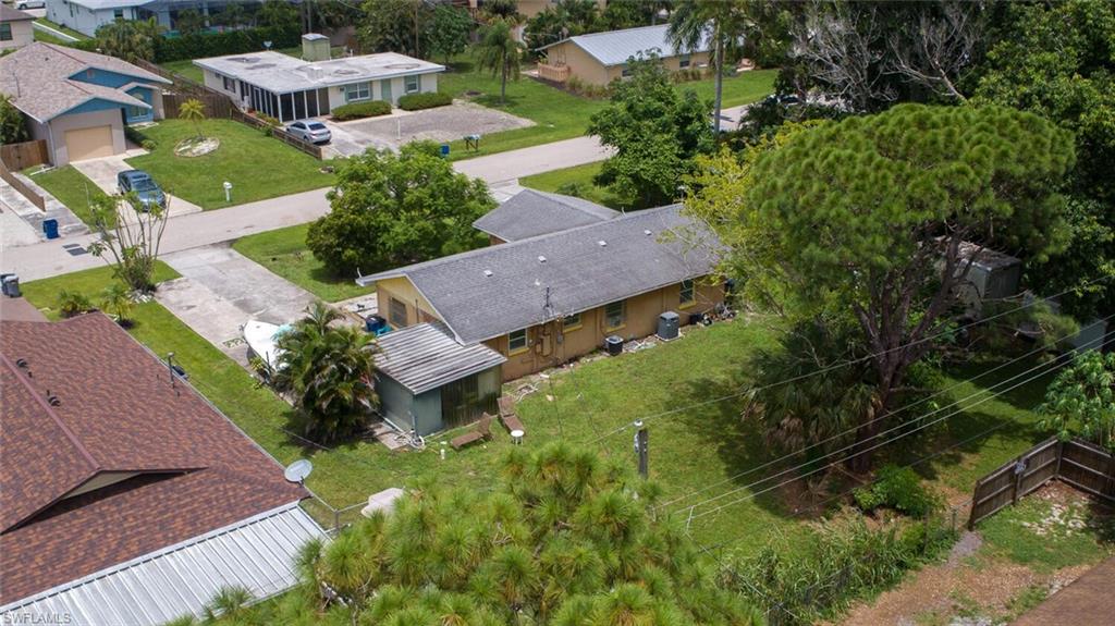 4391 Little Hickory Road Bonita Springs, FL 34134 - Photo 2 of 35 an aerial view of a house with a yard