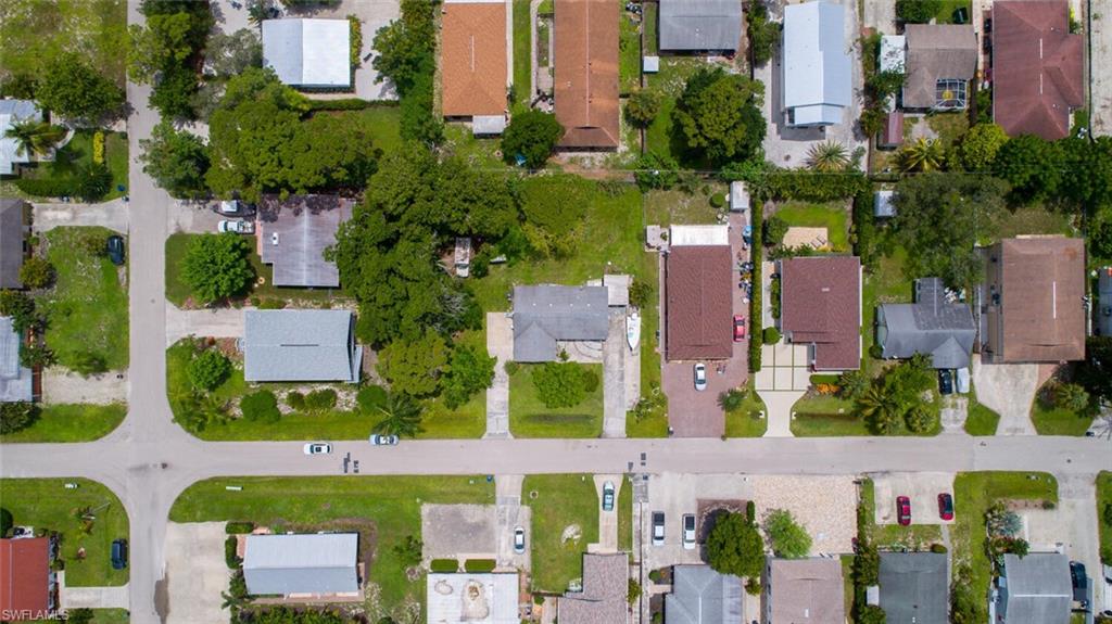 4391 Little Hickory Road Bonita Springs, FL 34134 - Photo 34 of 35 an aerial view of multiple house