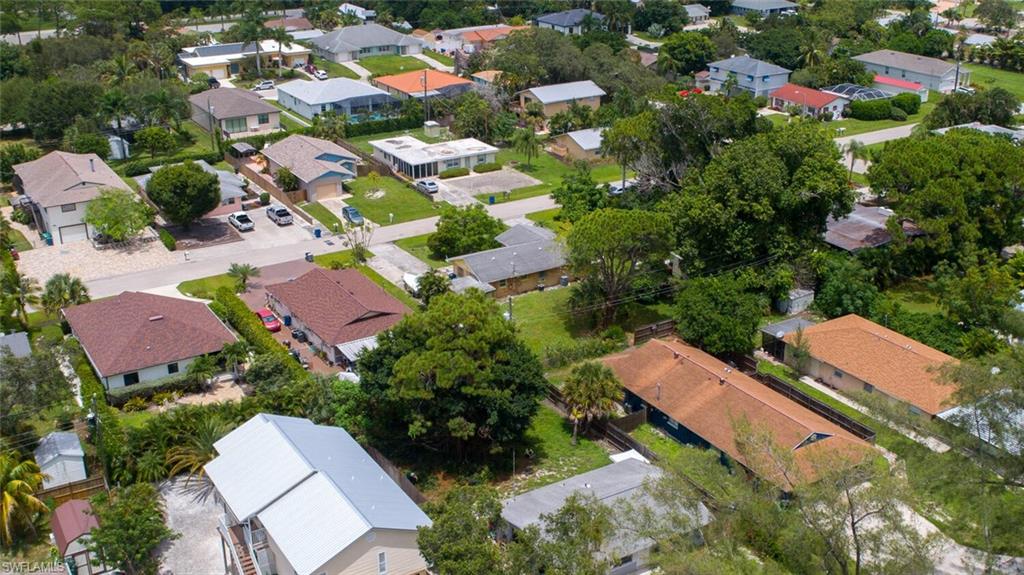 4391 Little Hickory Road Bonita Springs, FL 34134 - Photo 35 of 35 an aerial view of residential houses with outdoor space