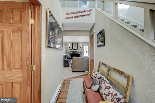 a room with furniture and stairs