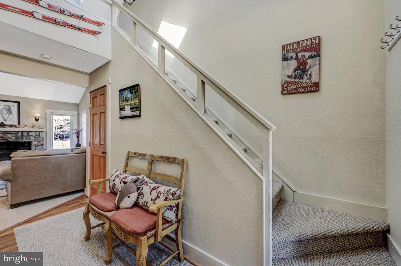 390 Snow Ridge Cir Lake Lake Harmony, PA 18624 - Photo 15 of 60 a room with furniture and stairs
