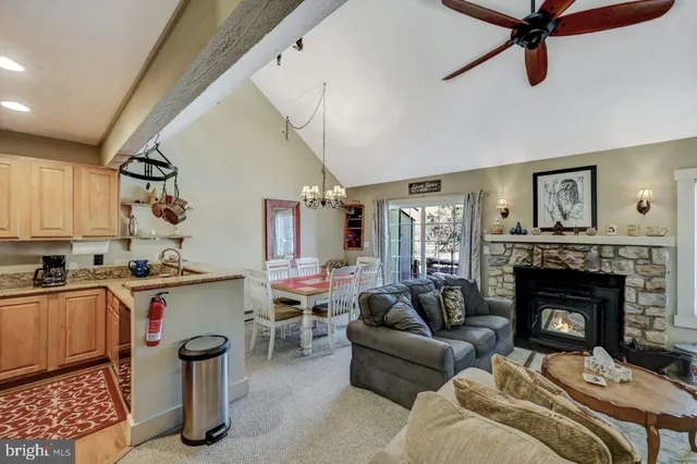 a bathroom with a toilet and shower