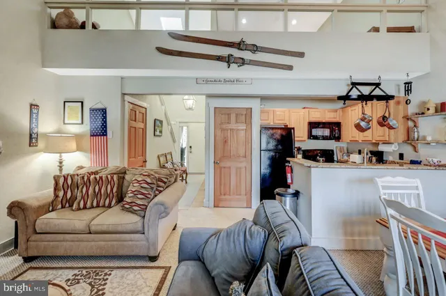 a view of a bathroom with a sink and a bath tub