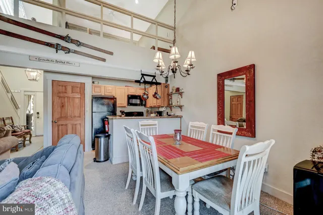 a bedroom with furniture and a flat screen tv