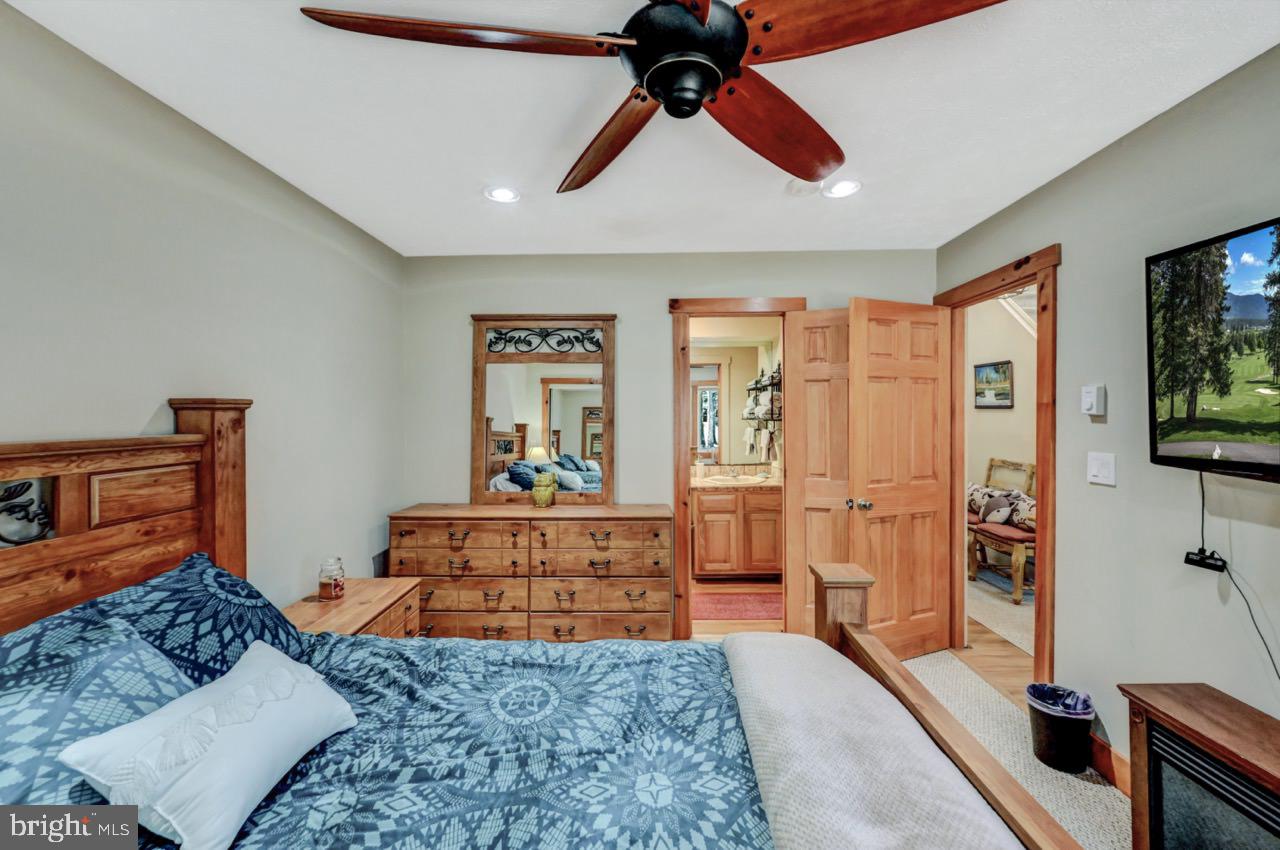 390 Snow Ridge Cir Lake Lake Harmony, PA 18624 - Photo 9 of 60 a bedroom with furniture and a flat screen tv