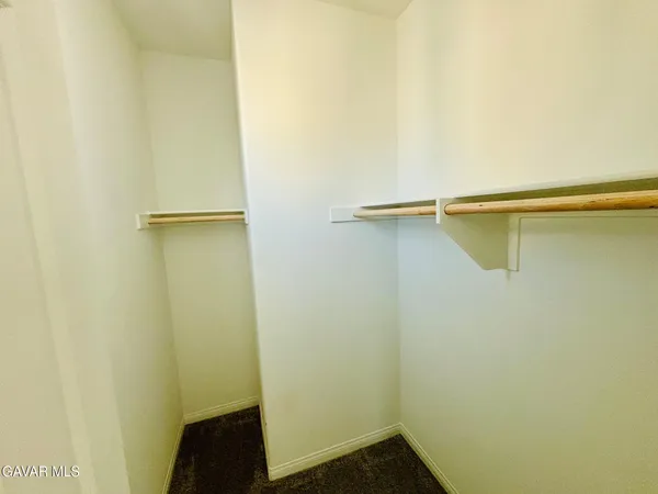 a view of small space with racks on the wall
