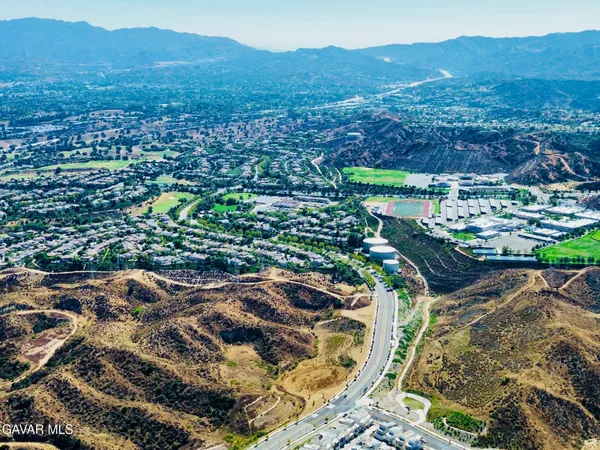 a view of a city and mountains