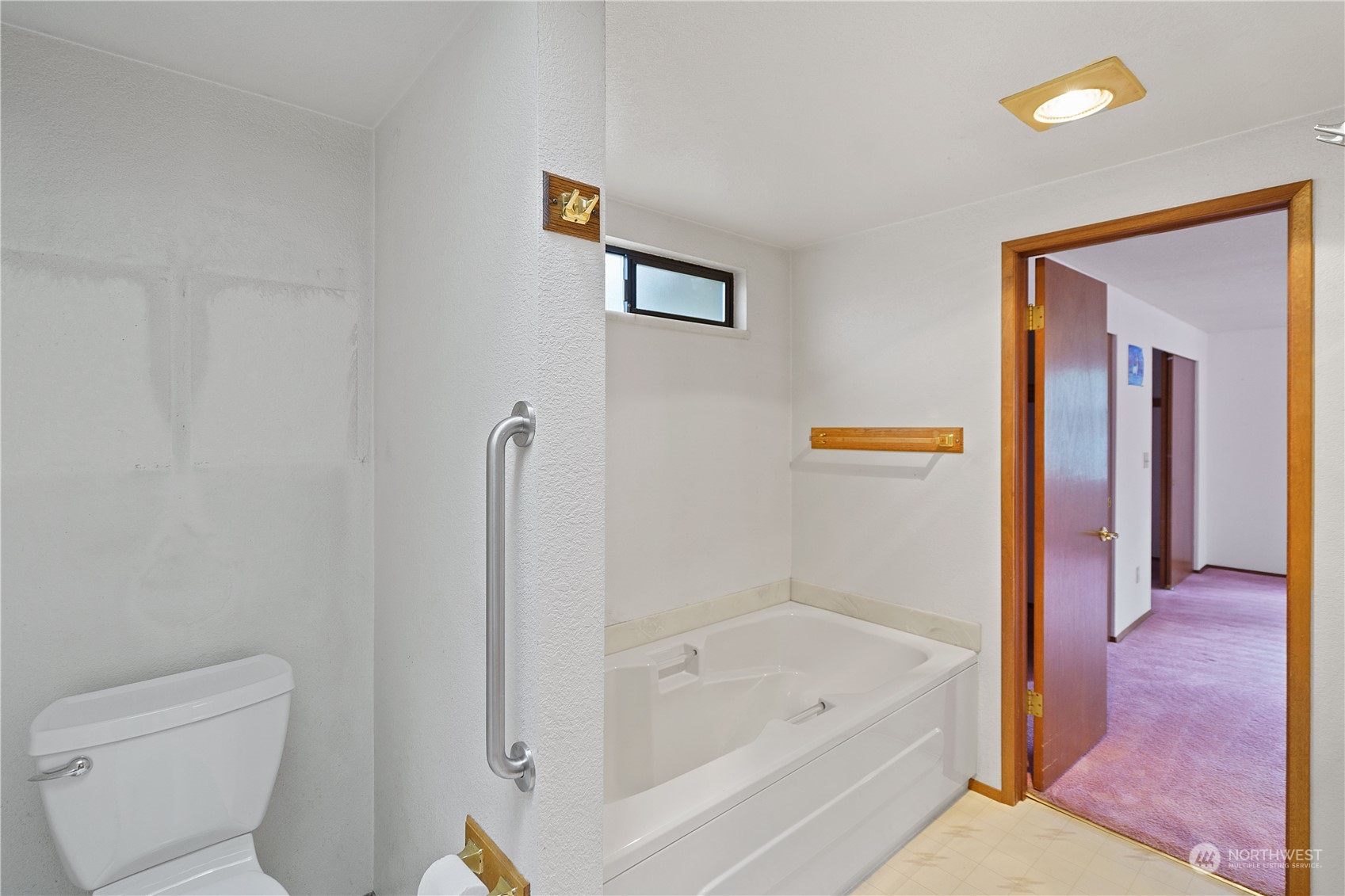 16632 124th Avenue Southeast Renton, WA 98058 - Photo 11 of 29 a bathroom with a bathtub and a shower