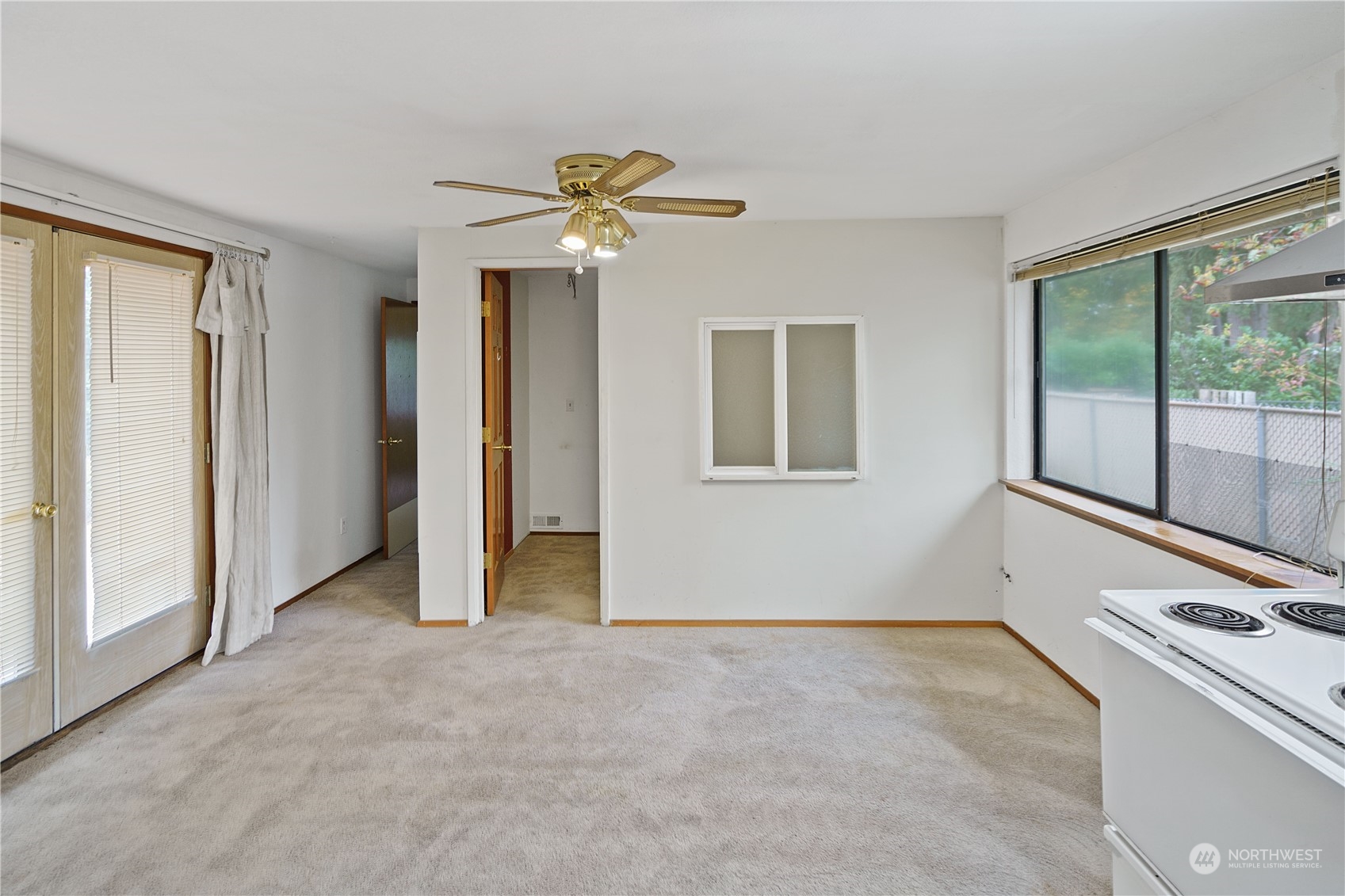 16632 124th Avenue Southeast Renton, WA 98058 - Photo 24 of 29 a view of an empty room with a window