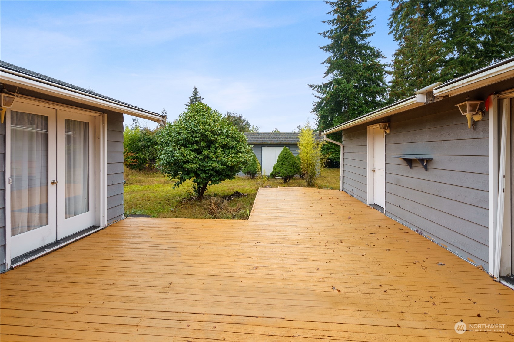16632 124th Avenue Southeast Renton, WA 98058 - Photo 9 of 29 a view of a backyard of the house