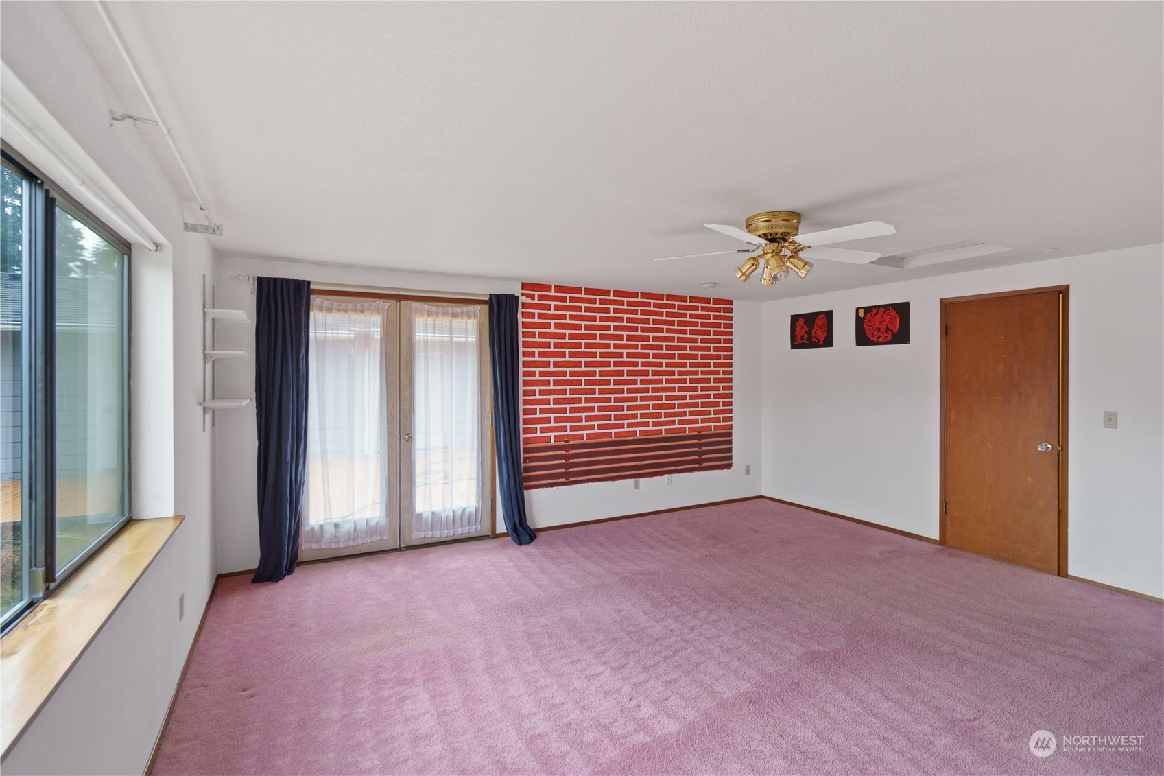 16632 124th Avenue Southeast Renton, WA 98058 - Photo 10 of 29 a view of an empty room with a window