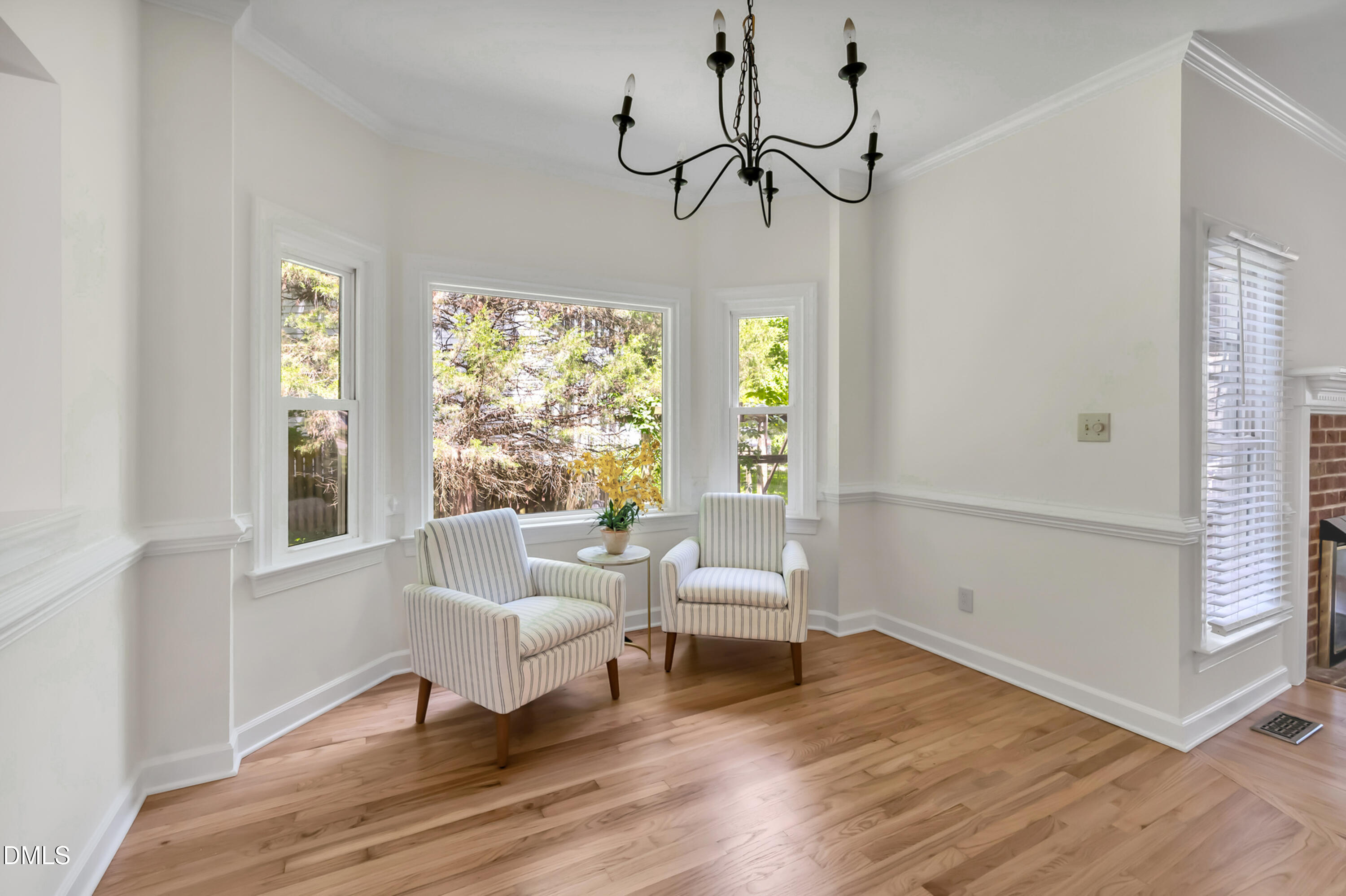 7500 Drayton Court Raleigh, NC 27615 - Photo 4 of 27 a living room with furniture and a window