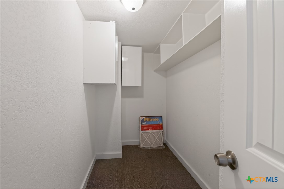 617 Bartlett Road Victoria, TX 77905 - Photo 27 of 30 a view of hallway with stairs and a closet