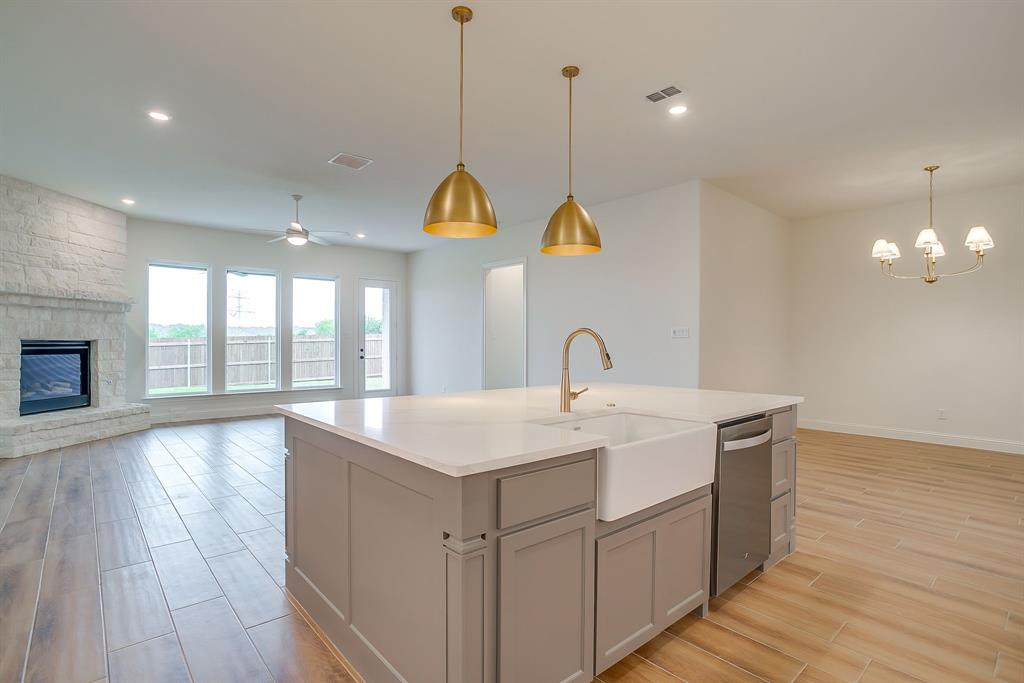 7286 Velvetleaf Street Benbrook, TX 76126 - Photo 18 of 39 a view of a sink and wooden floor