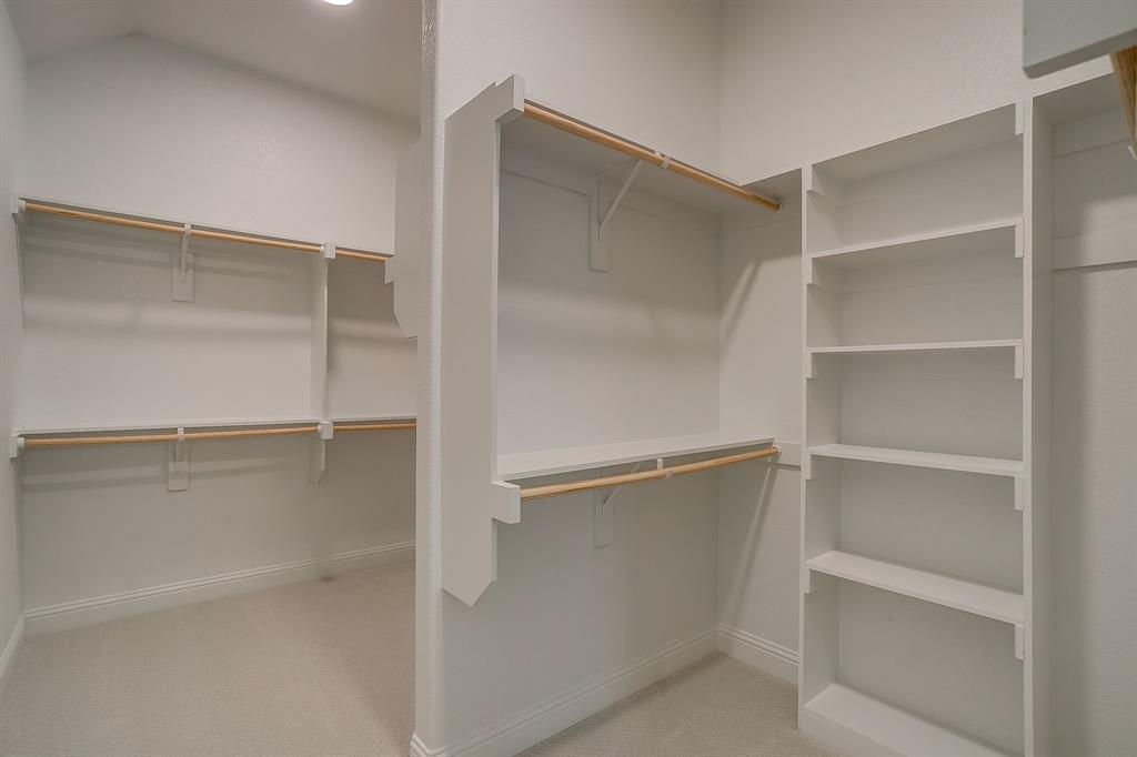 7286 Velvetleaf Street Benbrook, TX 76126 - Photo 33 of 39 a view of an empty walk in closet