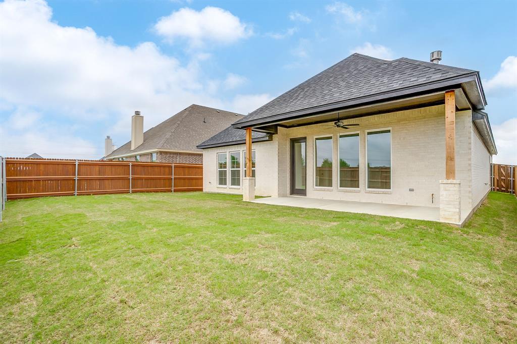 7286 Velvetleaf Street Benbrook, TX 76126 - Photo 37 of 39 a view of a house with a backyard