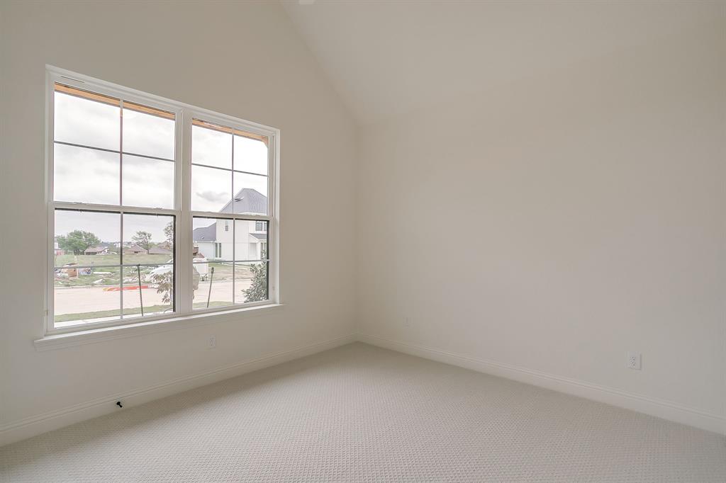 7286 Velvetleaf Street Benbrook, TX 76126 - Photo 6 of 39 an empty room with a window
