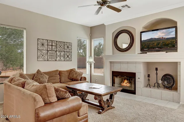 a kitchen with granite countertop a sink and cabinets
