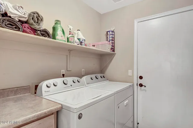 a bedroom with bed and a window