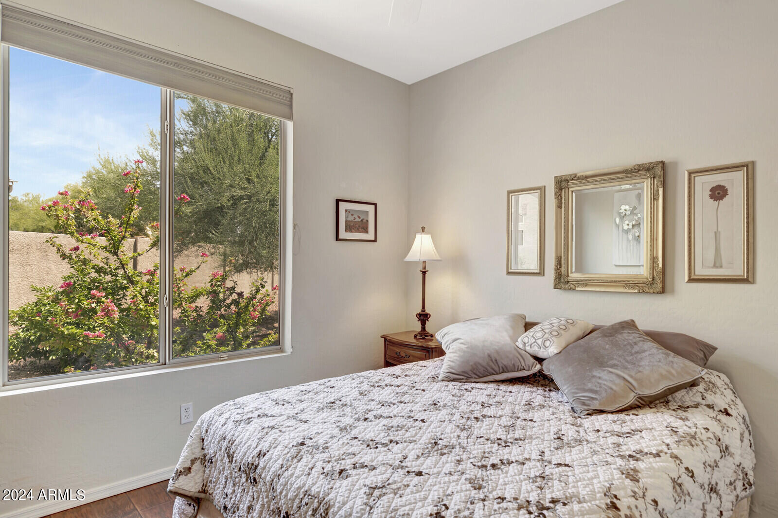 4343 East Mossman Drive Phoenix, AZ 85050 - Photo 18 of 36 a bedroom with bed and a window