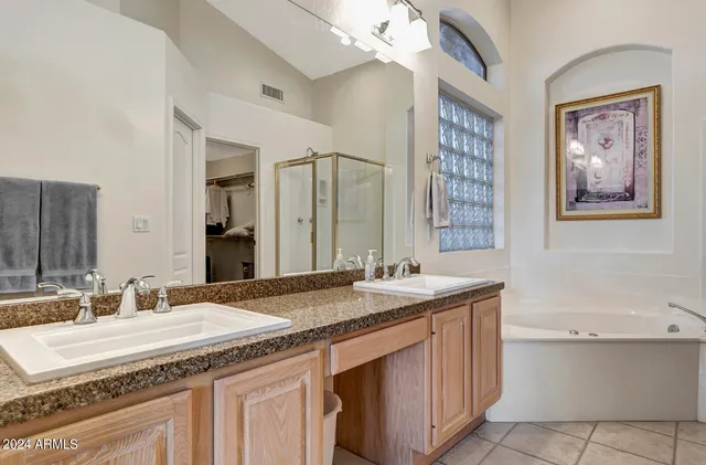 a view of a backyard with sitting area