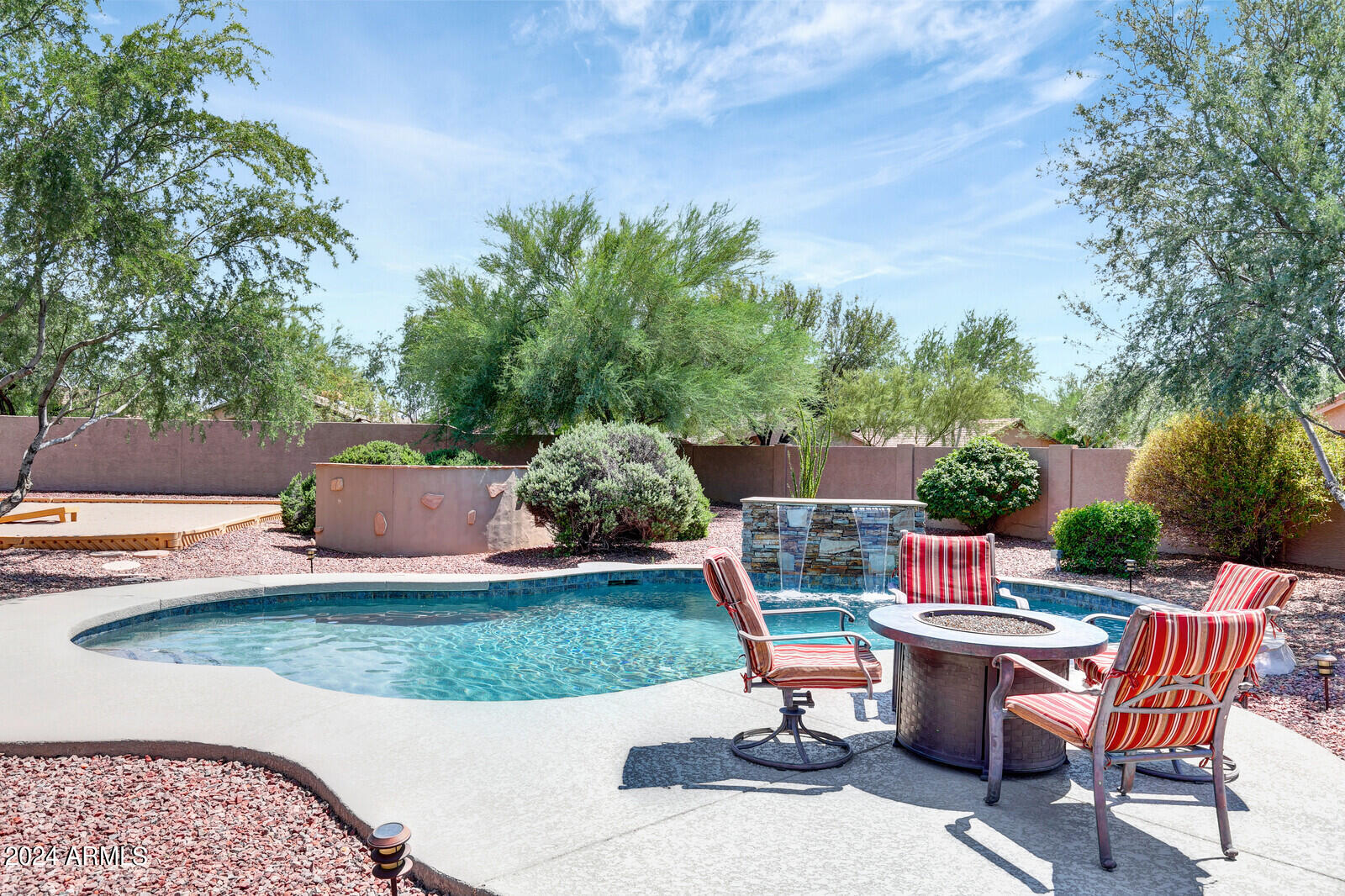4343 East Mossman Drive Phoenix, AZ 85050 - Photo 31 of 36 an outdoor space with furniture and garden