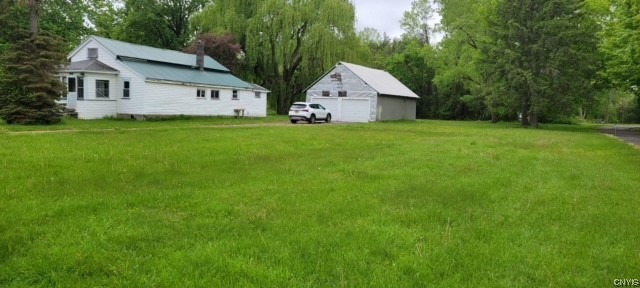 3008 Groth Road Murray, NY 14470 - Photo 3 of 34 Right side of home and garage