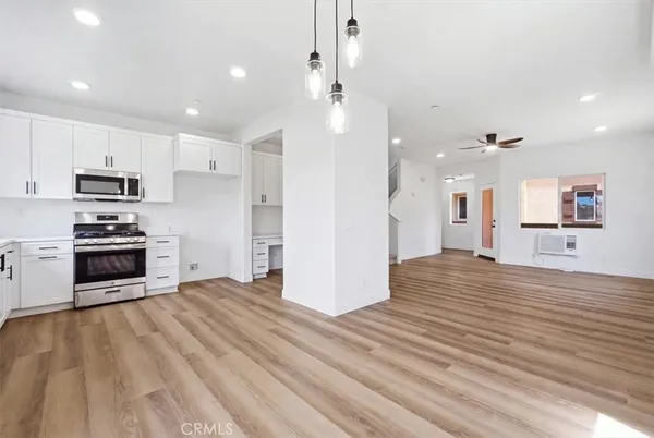a view of kitchen and microwave