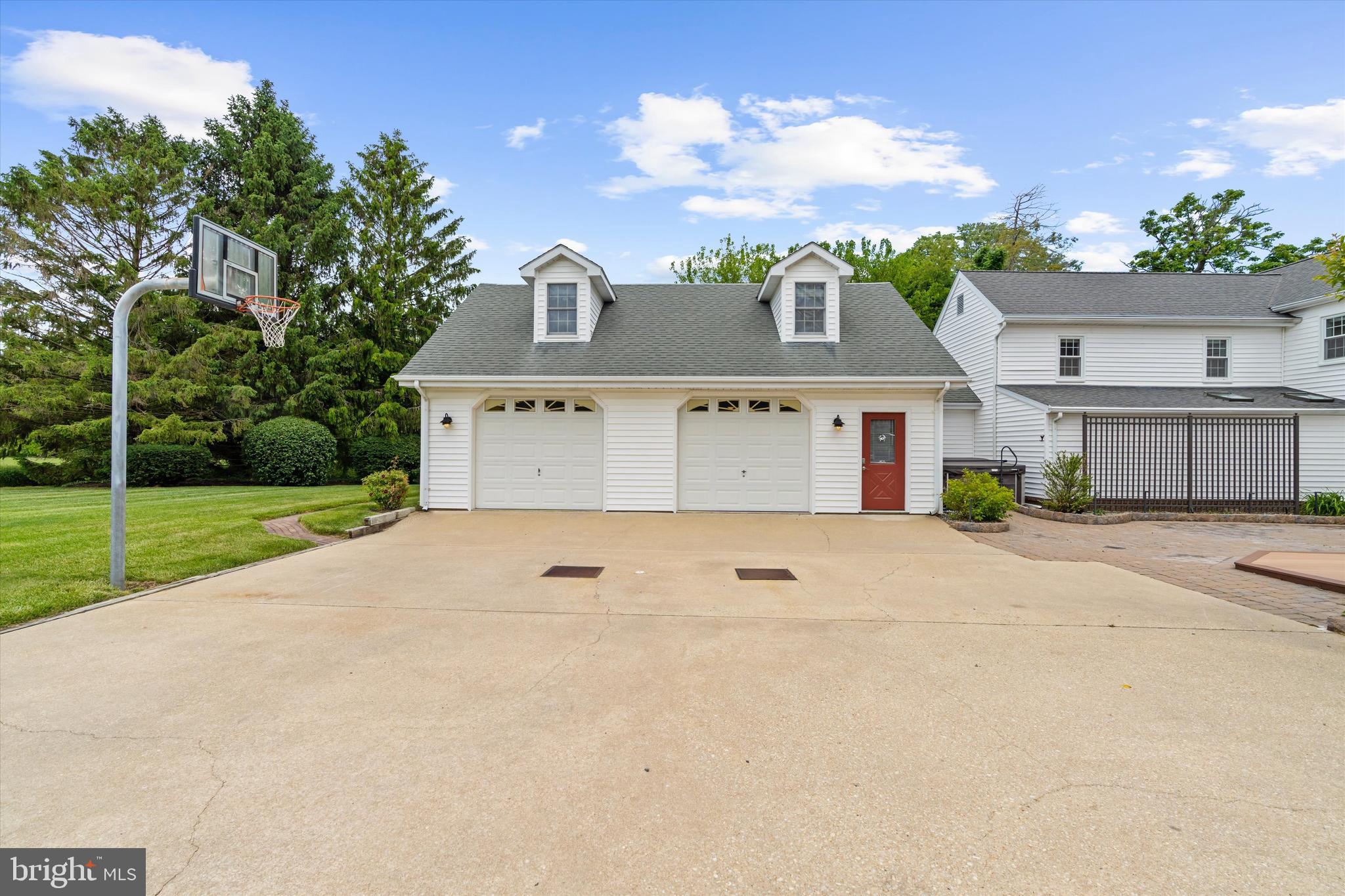 12714 Still Pond Road Still Pond, MD 21667 - Photo 25 of 62 a front view of a house with a yard and garage