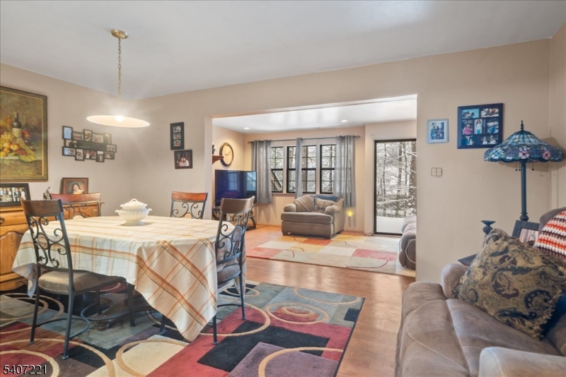 33 Concord Road, Unit D West Milford, NJ 07480 - Photo 17 of 39 a living room with furniture and wooden floor