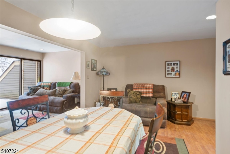 33 Concord Road, Unit D West Milford, NJ 07480 - Photo 21 of 39 a living room with furniture and a wooden floor