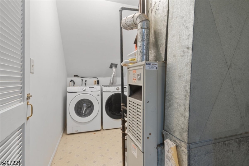 33 Concord Road, Unit D West Milford, NJ 07480 - Photo 31 of 39 a utility room with dryer and washer