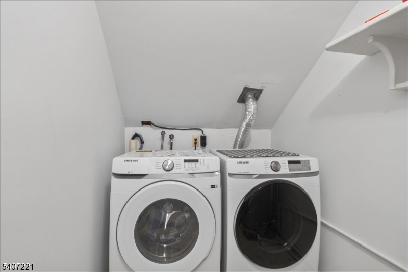 33 Concord Road, Unit D West Milford, NJ 07480 - Photo 32 of 39 a utility room with dryer and washer