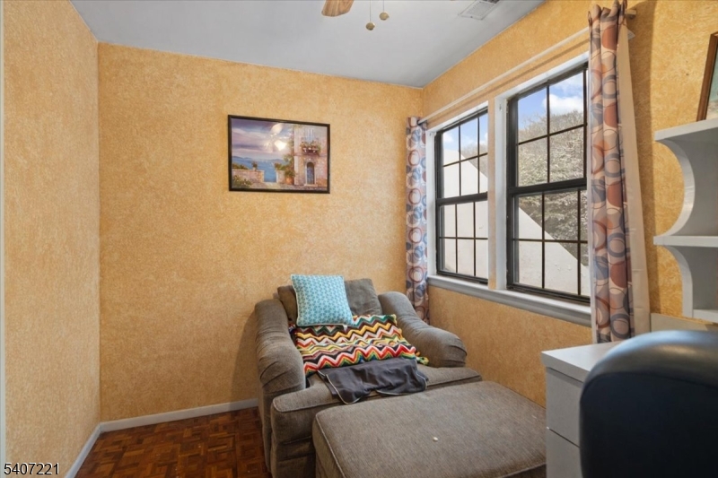 33 Concord Road, Unit D West Milford, NJ 07480 - Photo 36 of 39 a living room with furniture and a large window