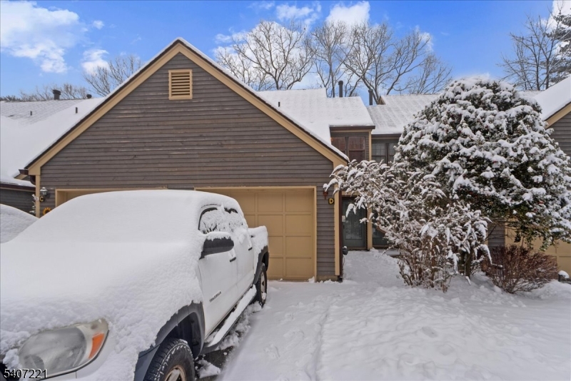 33 Concord Road, Unit D West Milford, NJ 07480 - Photo 8 of 39 a roof view covered with snow