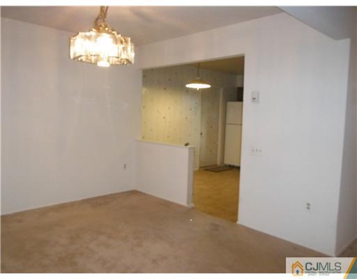 804 Pompton Road Monroe Township, NJ 08831 - Photo 11 of 12 view of a room with wooden floor